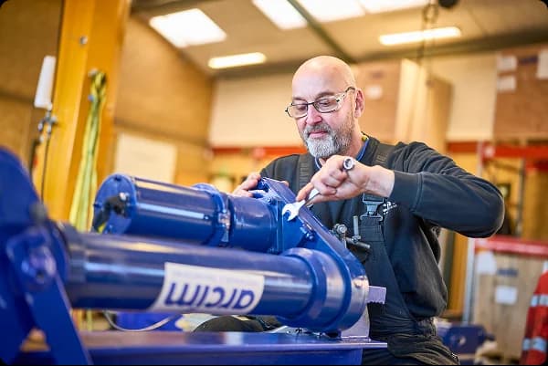 Engineer inspecting arcím actuator